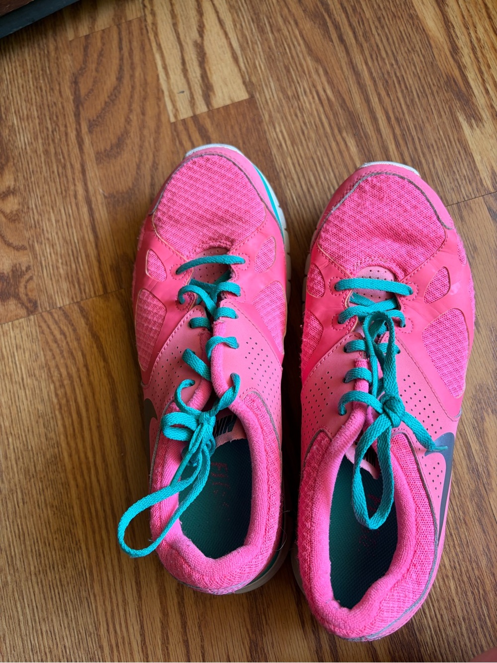 Nike Women's Hot Pink Running Shoes with Teal Laces